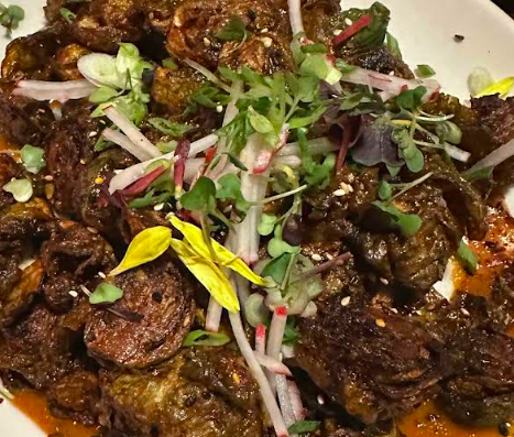 Dog And Pony signature dishes Korean Brussels Sprouts
Kimchi Chicken Wings
Bulgogi Cheesteak